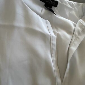 White Blouse with V-Neck Detail